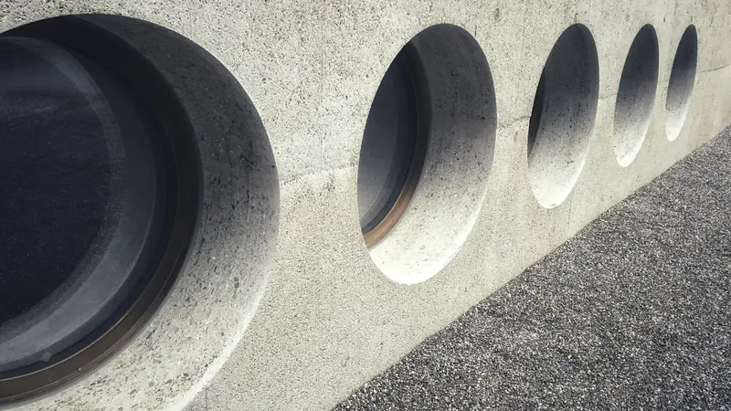 Circular openings in a concrete structure (illustrative photo)